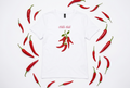 White women’s t-shirt with a red chilli illustration and “chilli slut” text in pink script